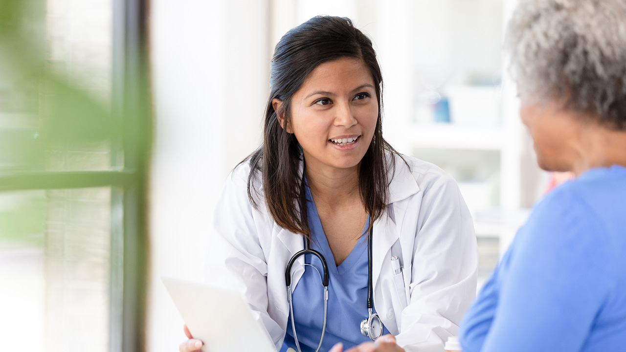 Health care people talking to their patient